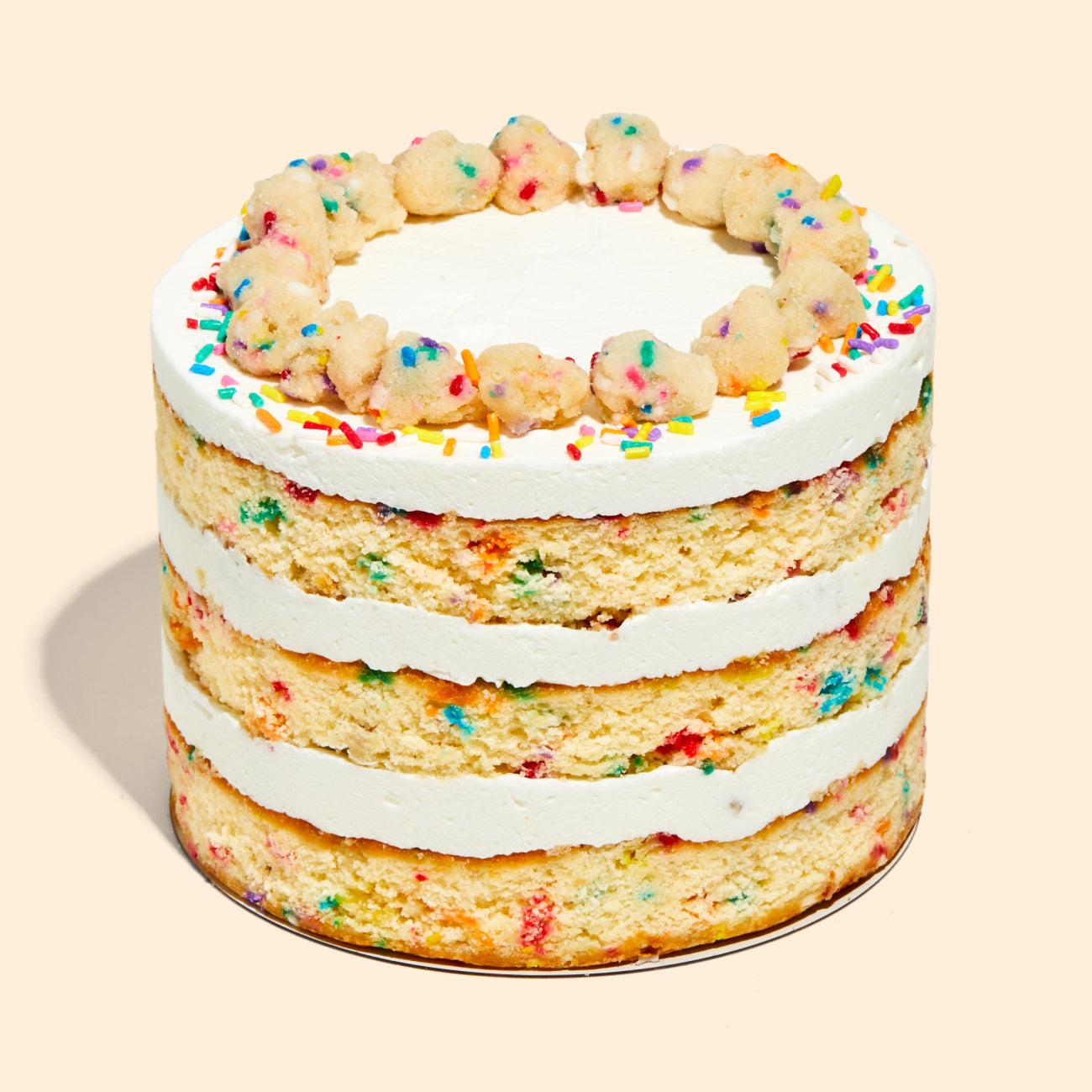side view of a whole 6 inch birthday cake