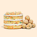 A 6" Birthday Cake next to a pile of b'day cake truffles.